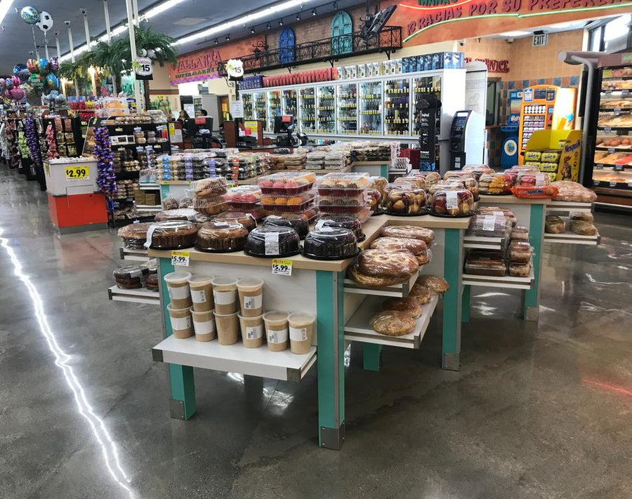 Display Table with baked goods and products in a grocery store