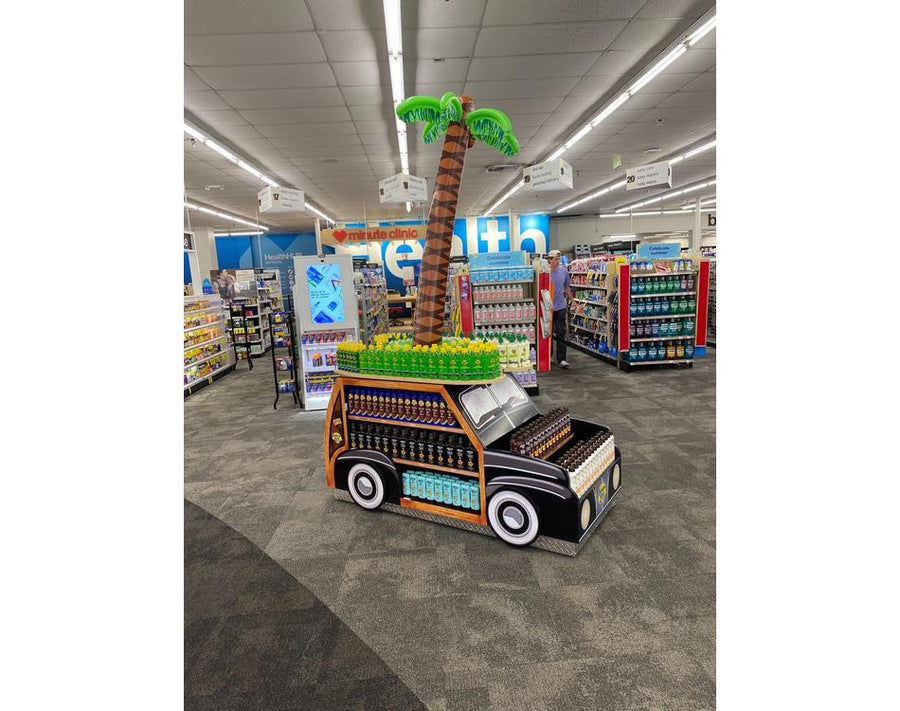 Depicts a Display Island in CVS shaped as a van with product
